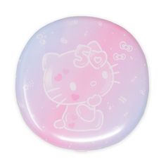 a pink hello kitty button on a white background