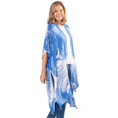 This Linda Anderson Blue Wave ruana can add the finishing touch to any outfit! Whether it's formal, casual, worn with a shirt and jeans, or a blouse with a skirt, this elegant accessory is the finishing touch to any look. This Linda Anderson Blue Wave ruana can add the finishing touch to any outfit! Whether it's formal, casual, worn with a shirt and jeans, or a blouse with a skirt, this elegant accessory is the finishing touch to any look. Lightweight Arm openings Tassel hem World Famous Linda A Blue Tassel Beach Cover-up, Blue Beach Tops With Tassels, Beach Blue Tops With Tassels, Blue Tassel Tops For Beach, Blue Fringe Tops For Summer, Blue Tassel Cover-up For Summer, Casual Summer Poncho With Fringe, Blue Tassel Tops For Summer, Casual Spring Poncho With Tassels