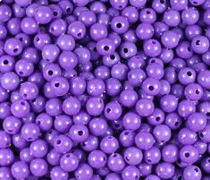 purple beads with holes in the middle are very bright and shiny, as well as they look