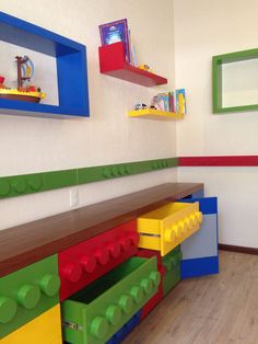 a room with legos on the wall and shelves