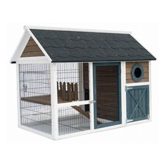 a small white and brown chicken coop