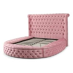 a pink bed with an upholstered headboard and foot board is shown in front of a white background