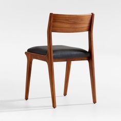 a wooden chair with black leather upholstered seat and backrest, viewed from the front