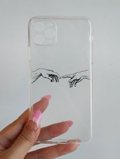 the creation of hands is depicted on a clear phone case