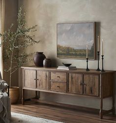 a living room scene with focus on the sideboard