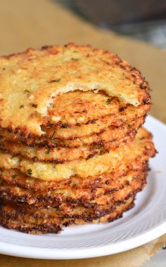 a stack of fried food on a white plate