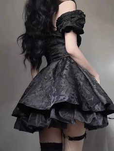 The Goth Black Princess Mini Dress blends elegance with a dark aesthetic. Its corset-style bodice with lace-up detailing defines the waist, while the layered mini skirt adds volume for a striking silhouette. Ideal for gothic events, cosplay, or embracing your inner dark princess with a touch of luxury. Goth aesthetic F Luxury Goth, Princess Mini Dress, Short Dresses Party, Goth Coquette, Coquette Dress, Layered Mini Skirt, Dark Princess, Crop Pullover, Black Princess