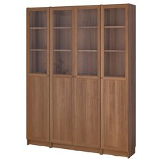 a wooden bookcase with glass doors and shelves