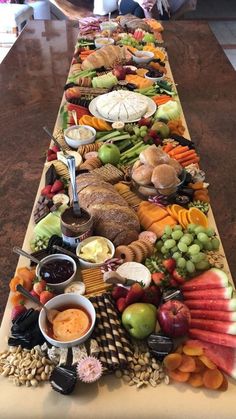 a long table filled with lots of different types of food