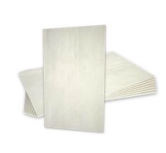 six white paper napkins stacked on top of each other