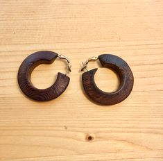 Wooden hoop earrings with post and latch closure. These are a dark wood tone. Brown Small Hoop Earrings With Ear Wire, Brown Hoop Earrings With Ear Wire, Wooden Earrings Diy, Makers Space, Wood Hoop Earrings, Wooden Hoop, Wooden Earrings, Wooden Rings, Jewelry Earrings Hoops