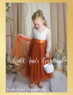 Burnt Orange Flower Girl Dress in Long Sleeves This luxurious tulle flower girl dress in a whimsical boho style adds a refined touch to any wedding. This dress is so soft and light your child will love wearing it. Available in so many colors it will be hard to choose just one. Dress Features A soft white bodice, made of stretchy lace with a "V" shaped on the back, edged with delicate lace A cotton liner under 2 layers of soft tulle that won’t itch your princess. Dress length of mid-calf to floor Fall Flower Girl, Fall Flower Girl Dresses, Flowergirl Dress, Tulle Flower Girl Dress, Burnt Orange Dress, Tulle Flower Girl, Tulle Flowers, Wedding 2025, Dress Sash