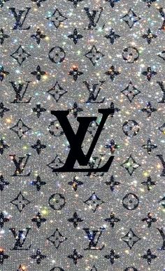 the louis vuitton logo is covered in glitter