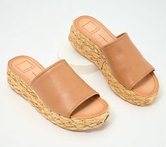 This fashionable flatform sandal pairs sleek leather with boho-chic raffia, creating a cool juxtaposition that's just as at home at the beach resort as it is in the city center. From Dolce Vita. Raffia Sandals, Flatform Sandals, Only Shoes, City Center, Beach Resort, Slide Sandals, At The Beach, Boho Chic, The City