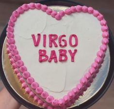 a heart shaped cake with the words virgo baby written on it