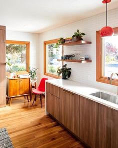 the kitchen is clean and ready to be used as a living room or dining area