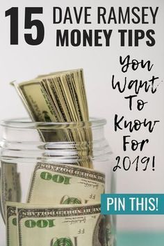 a jar filled with money sitting on top of a table