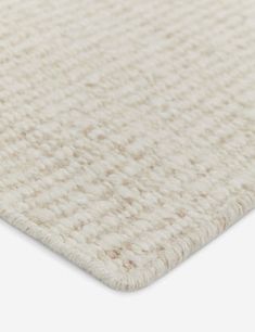 the textured rug is white and beige