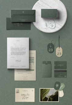 an assortment of stationery items including envelopes and business cards