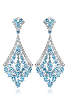 A mix of colors and shapes distinguish polished drop earrings set with sparkling topaz. Total topaz weight: 6.00ct. Sterling silver/blue topaz/white topaz Imported Blue Topaz Jewelry Set, Octopus Pendant, Bold Lipstick, Diamond Pendants Designs, Blue Topaz Jewelry, Expensive Jewelry Luxury, Tiffany Jewelry, Beautiful Costumes, Expensive Jewelry