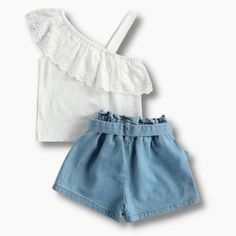 This is such a cool and refreshing outfit for this summer. It features a half off-shoulder with a strap that makes the simple top look very stylish. The detailed lace design will make your little girls stand out in this simple yet stylish outfit. It comes with matching denim shorts. Style it with hat and sandals to complete a summer look. Collar: O-Neck Closure Type: Pullover Model Number: Kid girl outfit Material: Cotton Sleeve Length(cm): Sleeveless Suggested size Suggested Age Top Lenght Bust Simple Top, Shorts Outfit, One Shoulder Top, Shorts Style, Girl Standing, Stylish Outfit, One Shoulder Tops, Lace Design, Summer Looks