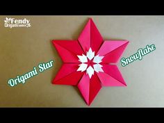 an origami star with snowflake written on it