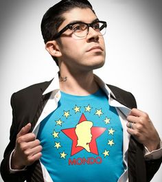 a man wearing a shirt with the word mondo on it and stars around his chest