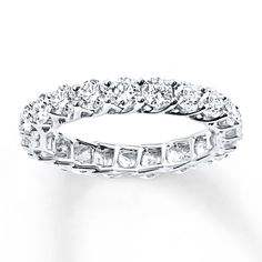 Sparkling round diamonds encircle the band of this stunning eternity ring, suggesting a love that never ends. Crafted of 14K white gold, the ring has a total diamond weight of 2 carats. From the Now + Forever® Bridal Collection. La Confidential, Gorgeous Rings, Morning Meetings, Diamond Eternity Ring, Eternity Rings, Razzle Dazzle, Manifestation Board, Buying Diamonds, Eternity Ring Diamond