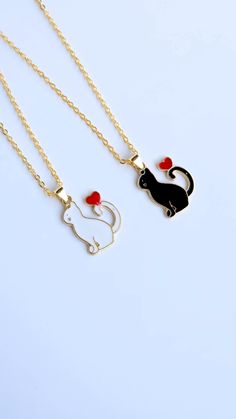 New 14k Gold Plated Black & White Cat Charm Chain Necklace SET Autumn Necklace, Halloween Necklace, Handmade Jewellery, Gift for Her This enchanting set features two gold-plated necklaces: one with a charming white cat and the other with a sleek black cat charm. Ideal for couples or friends, these necklaces can be worn together or gifted separately. Both necklaces are crafted with hypoallergenic, nickel-free, and lead-free materials, ensuring comfort and style. -Gold-plated chain -Adjustable length  (necklace length is 42 cm + 5cm extender chain) -Handmade with care An ideal gift for birthdays, anniversaries, Valentine's Day, or just because. ✨ Grab your set today and get ready for the season! S I Z I N G Please note many of my bracelets and necklaces come with adjustable parts, but there Cat Charm Necklace, Necklace Cat, Minimalist Jewellery, Autumn Necklace, Halloween Necklace, Charm Chain, Cat Charm, Necklace Minimalist, Cat Necklace