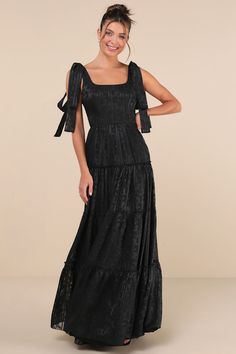 You'll stand out in everyone's memory with an adorable look like the Lulus Picturesque Allure Black Jacquard Tie-Strap Maxi Dress! Lightweight woven fabric, with a shiny, burnout floral jacquard and striped pattern throughout, falls from tying straps into a flattering square neckline and a princess-seamed bodice. High, fitted waist sits atop a ruffled, tiered skirt that finishes at an elegant maxi hem. Smocked panel at back and hidden zipper/clasp. Fit: This garment fits true to size. Length: Floor length. Size medium measures 60.5" from shoulder to hem. Bust: Great for any cup size. Waist: Fitted - very fitted at natural waist. Hip: Not Fitted - fuller skirt allows room for hips. Undergarments: May be worn with a strapless bra, adhesive bra, petals, or no bra. Fabric: Fabric has no stretc Adhesive Bra, Floral Jacquard, Jacquard Dress, Tiered Maxi Dress, Tier Skirt, Strapless Bra, Tiered Skirt, Full Skirt, Square Neckline