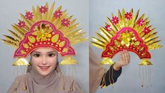 the woman is wearing a headdress made out of gold and red