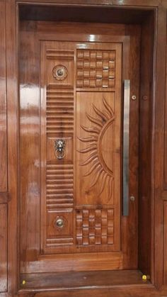 a wooden door with an intricate design on it