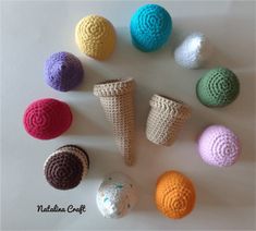 crocheted balls and cones are arranged in the shape of an ice cream cone