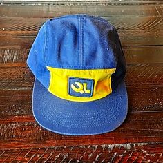 Authentic Quiet Life 5 Panel Camper. Navy Blue With Yellow Gold Front Panel, Ql Sewn On Patch And Nylon Closure Strap. Brand New W/O Tags.. Adjustable Blue Baseball Cap For Camping, Adjustable Blue Hat For Camping, Retro Blue Hats For Outdoor, Blue Curved Brim Hat For Camping, Casual Blue Hats For Camping, Casual Blue Hat For Camping, Blue Casual Snapback Hat For Outdoor Activities, Blue Retro Snapback Hat For Outdoor, Retro Blue Snapback Hat For Outdoor