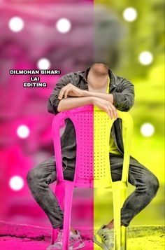 a man sitting on top of a yellow and pink chair