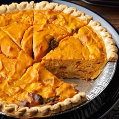 a pie sitting on top of a metal pan