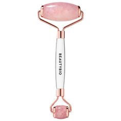 A 100% solid Brazilian rose quartz dual-ended roller that helps contour, depuff, and seal in skincare for face and body.Skin Type: Normal, Dry, Combination, and Oily Skincare Concerns: Puffiness, Pores, and RednessWhat Else You Need to Know: This rose quartz roller supports lymphatic drainage and reduces the appearance of facial puffiness, including the appearance of dark under-eye circles. It also helps improve the appearance of pores and enhances skin’s natural glow. Each stone is also careful Facial Puffiness, Rose Quartz Roller, Quartz Roller, Body Roller, Eye Roller, Spa Home, Dark Under Eye, Face Roller, Jade Roller