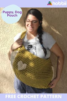 a woman is holding a crocheted bag with a heart on it and the text puppy dog pouch