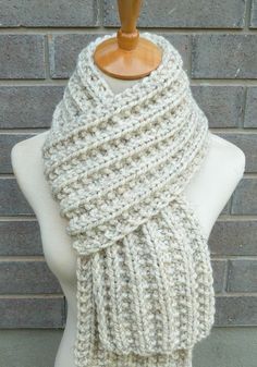 "This beautiful hand knitted scarf is made with Super Bulky and Soft Wool Blend Yarn (80% Acrylic, 20% Lambswool). The pattern looks the same on both sides. The scarf can be worn in multiple ways. Amazing color for the fall/winter season. It goes with everything. The color may appear slightly different on different monitors. Measures: 63\" (160 cm) long x 7.5\" (19 cm) wide. From a smoke-free home. Care instructions: Hand wash in cool water and dry flat." Bulky Knit, Hand Knit Scarf, Circle Scarf, Super Bulky, Wool Scarf, Soft Wool, Knit Scarf, Winter Season, Beautiful Hand