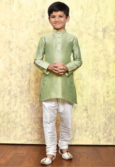 This exquisite Kids Kurta Set is specially crafted for Birthdays , Indian weddings and festivals. The set includes a beautifully self-embroidered Dopion art silk top, paired with your choice of a ready-made Dhoti, Chudidar or Patiyala bottom. Attributes 1. Top - Premium Quality Cotton Silk Fabric 2. Bottom - Ready Made Chudidar/ Doti/Patiyala 3.  Color -Pistachio ,Fawn,Maroon, Light Beige,Green Note For Perfect Fitting * Pls Check the kid's Body Chest Exact Measurement With Out Adding Any Space or Gap From Your Side Boys Wedding Dress, Kurta Pajama For Boys, Wedding Dress Kids, Boys Sherwani, Ring Bearer Suit, Kids Kurta Pajama, Kids Ring, Green Boys, Kids Kurta