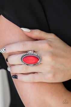 A fiery red stone is pressed into an ornate silver frame rippling with studded and serrated textures for a seasonal flair. Features a stretchy band for a flexible fit. Sold as one individual ring. Trendy Fringe, Stretchy Rings, Open Range, Red Ring, Red Stone Ring, Colorful Frames, Silver Frames, Ball Necklace, Rhinestone Ring