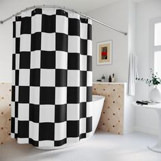 a black and white checkered shower curtain in a bathroom with a bathtub next to it