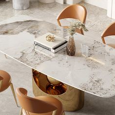 a marble dining table with chairs around it