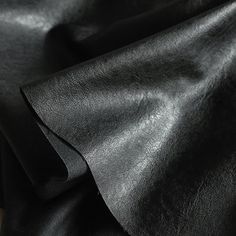 black leather textured up close to the surface