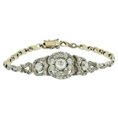 This is a truly wonderful 14ct yellow gold bracelet from the Victorian era. The focal point of the bracelet is a large rose cut centre stone which is surrounded by an array of further rose cut diamonds. The bracelet is of continental origin and although the back is 14ct gold the front is silver to emphasise the lovely sparkle of the diamonds. The bracelet features a secure push down clasp. Condition: Used (Very Good) Weight: 13.3 grams Central Diamond: Approx. 0.50 carats, Colour: G, Clarity: VS Luxury Victorian Gold Bracelet, Luxury Victorian Sterling Silver Bracelet, Cabin Door, Victorian Bracelet, The Victorian Era, Yellow Gold Bracelet, Gorgeous Jewelry, Clueless, Dream Jewelry