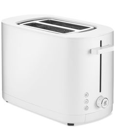 a white toaster sitting on top of a counter