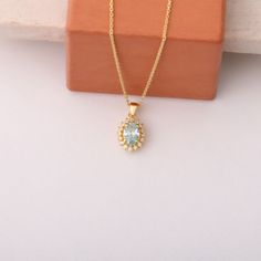 Celebrate the brilliance of March with our exquisite March Birthstone Necklace, featuring a stunning oval cut aquamarine pendant elegantly encircled by a shimmering real diamond halo. Handcrafted with love and precision from premium 14K solid gold, this luxurious piece is more than just jewelry; it's a heartfelt reminder of the beauty and tranquility that the aquamarine represents. The ethereal aquamarine gemstone, known for its calming properties, is beautifully showcased in this statement neck March Birthstone Necklace, Aquamarine Bracelet, Necklace Elegant, Aquamarine Pendant, Aquamarine Necklace, Solid Gold Chains, Aquamarine Jewelry, March Birthstone, Aquamarine Gemstone