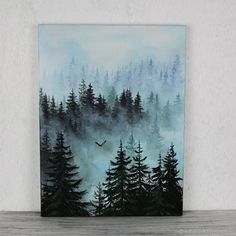 an acrylic painting of trees in the fog with a bird flying over them