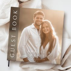 a wedding guest book with an image of a couple on the front and back cover