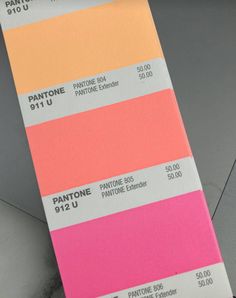 a pantone color swatch showing the different shades of pink, orange, and yellow